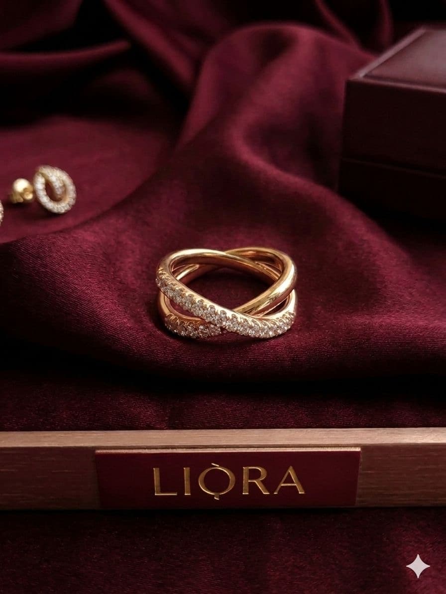 ZYRO — diamond crossover ring on deep burgundy velvet with branded jewellery box